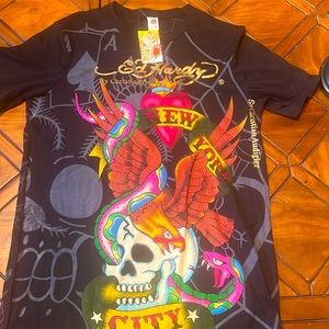 New with tags Christian Audigier t shirt XXL fits like a Large.